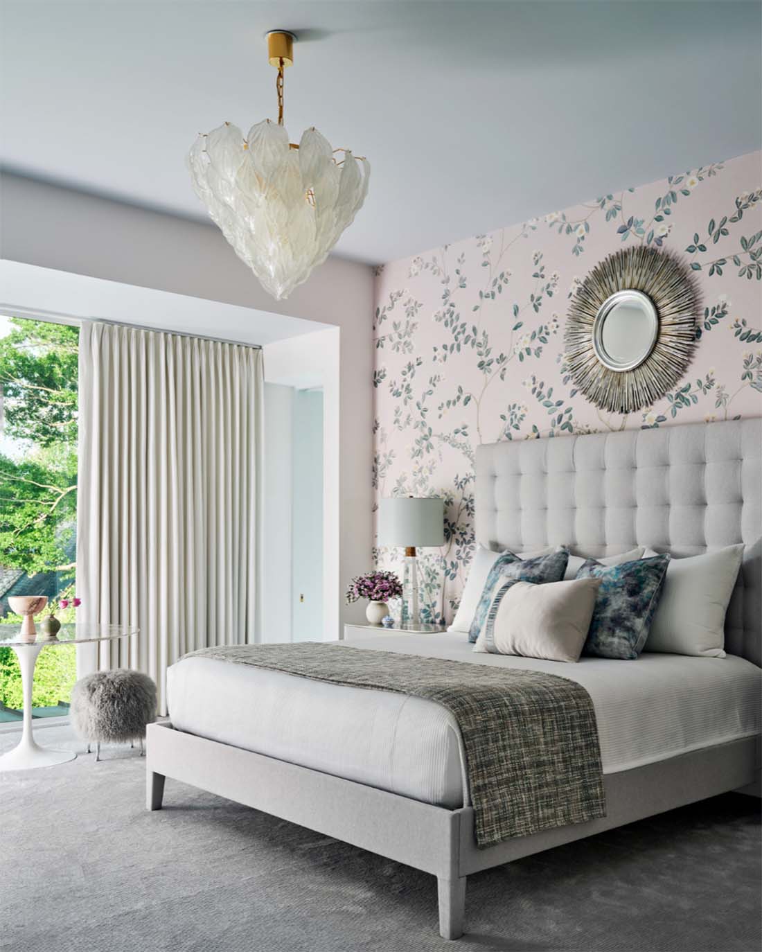 Luxury bedroom with botanical wallpaper accent wall